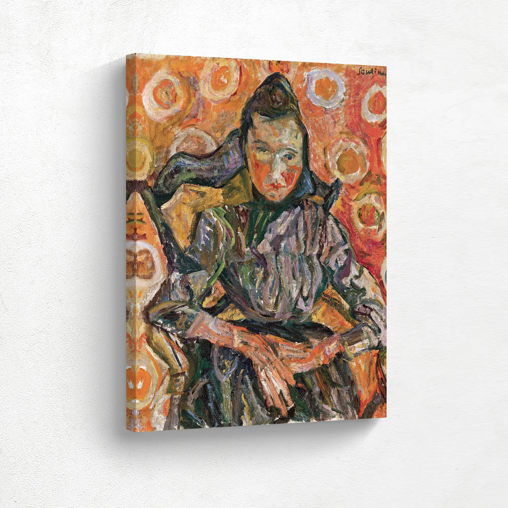 Woman sitting in an armchair
