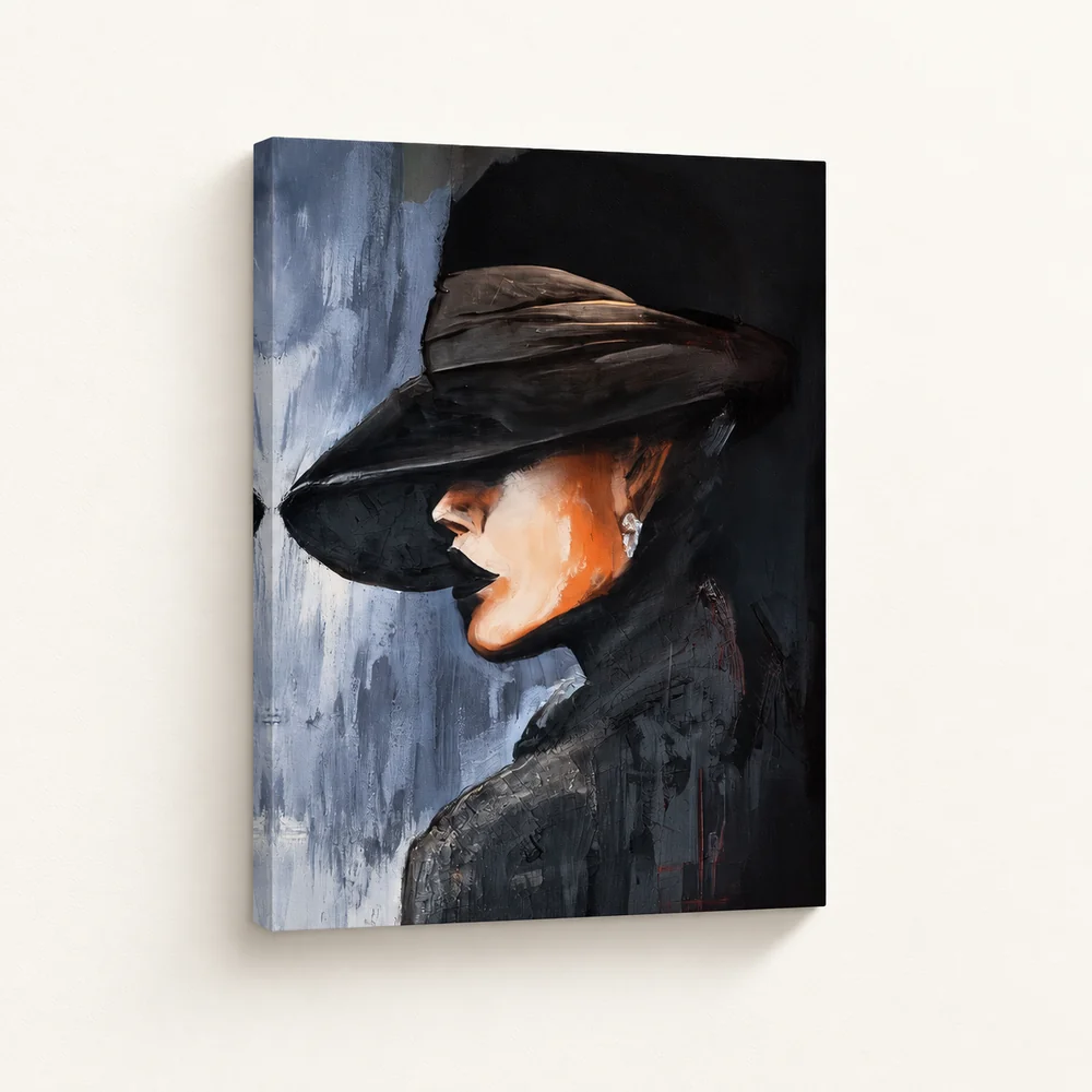 Angled view of a gallery-wrapped canvas print featuring a woman in a black hat on an ivory wall
